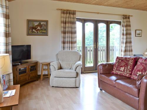 Μια τηλεόραση ή/και κέντρο ψυχαγωγίας στο Woodside Lodge - Hw7520