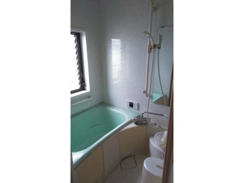 Ένα μπάνιο στο Guesthouse Farmor - Vacation STAY 15083v