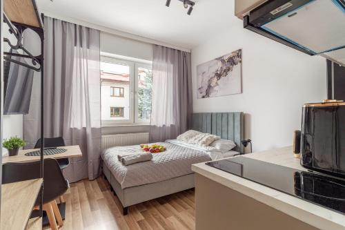 En eller flere senge i et værelse på Bemovia House