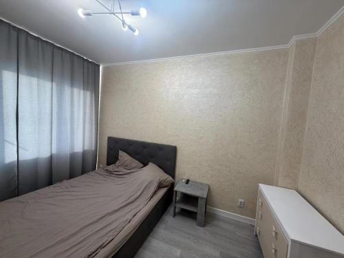 Ένα ή περισσότερα κρεβάτια σε δωμάτιο στο Neue Wohnung