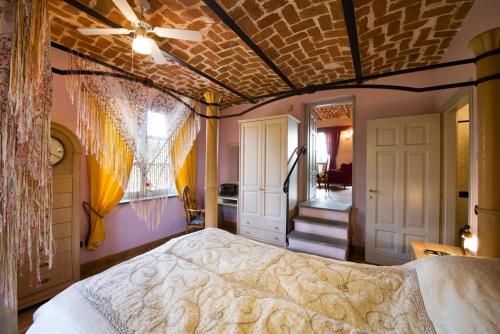 Una cama o camas en una habitación de Cascina Desderi