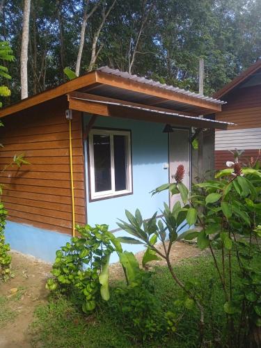 a small house with a brown at Bang risskee home stay1 in Ko Yao Noi