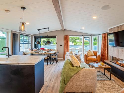 Χώρος καθιστικού στο Coed Aros Lodge