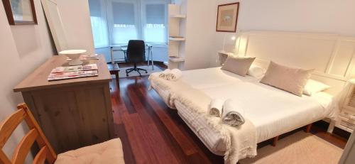 Ένα ή περισσότερα κρεβάτια σε δωμάτιο στο NEGURI 5 y 3 Garden Metro y Playa