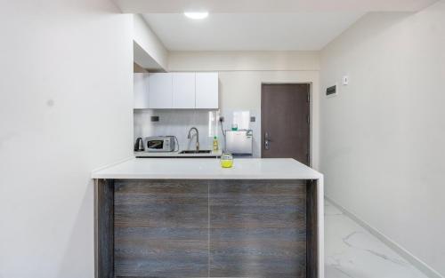 Kuchyň nebo kuchyňský kout v ubytování Kindaruma Homes Apartments