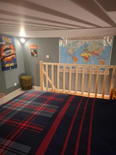 Voodi või voodid majutusasutuse Maisonnette Rétro Loc toas