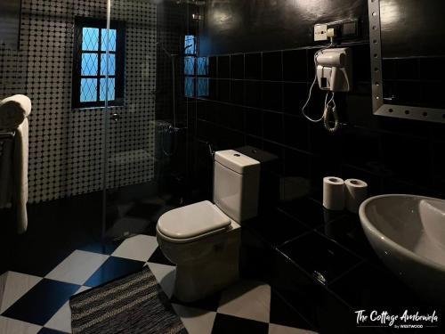 Koupelna v ubytování The Cottage Ambewela by 47