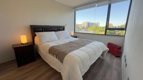 Ένα ή περισσότερα κρεβάτια σε δωμάτιο στο Oceana Suites en Los Angeles