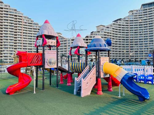 a playground with colorful slides and slidesktop at Apartments in Ain Sokhna in Porto in Ain Sokhna