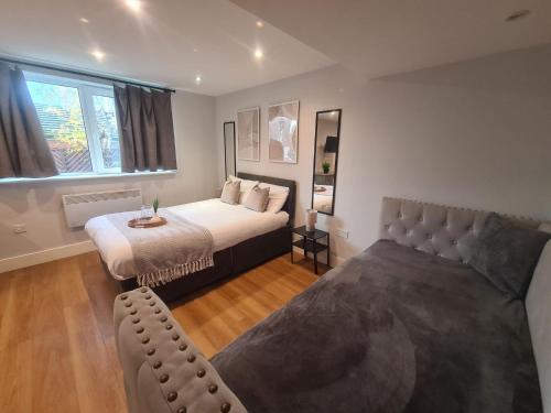 Postel nebo postele na pokoji v ubytování The City Collection