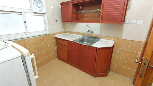 Køkken eller tekøkken på شقق نماء الفندقية