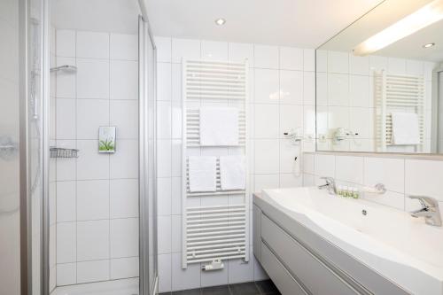 Koupelna v ubytování Apart-Garni Alpevita