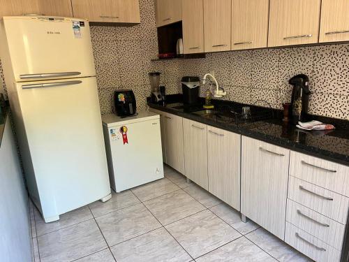 Una cocina o zona de cocina en Casa Girassol