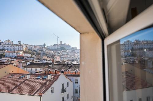 a view from a window of a city at GuestReady - Terrace Cozy Stay in Coimbra