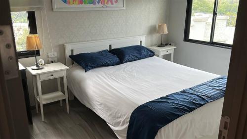 Ένα ή περισσότερα κρεβάτια σε δωμάτιο στο Апартаменты Пхукет