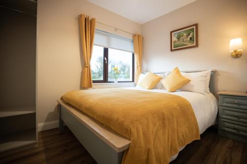 Ένα ή περισσότερα κρεβάτια σε δωμάτιο στο Friels Terrace