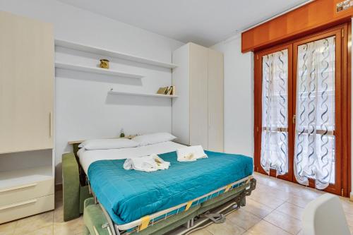 Ένα ή περισσότερα κρεβάτια σε δωμάτιο στο Green Stay Bresso - due passi dal Niguarda