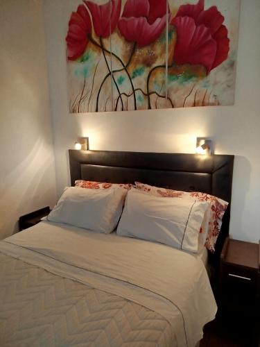 Ένα ή περισσότερα κρεβάτια σε δωμάτιο στο Estilo y confort en San Nicolás