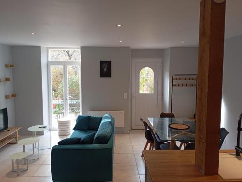 Χώρος καθιστικού στο Gite La maison du gardien