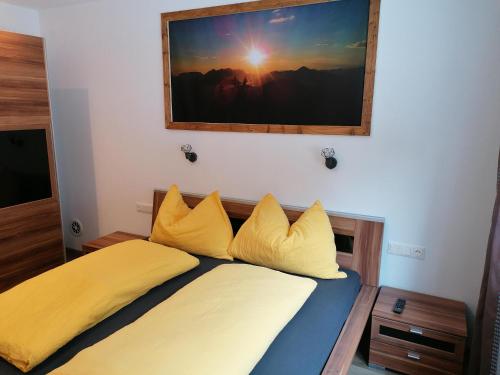 Ένα ή περισσότερα κρεβάτια σε δωμάτιο στο Appartement Holaus