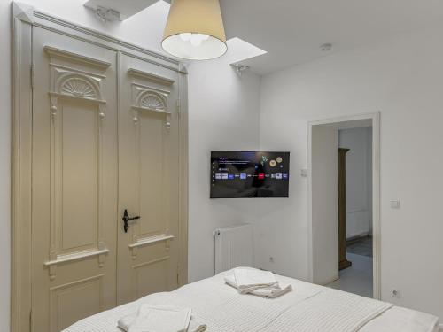 Ένα ή περισσότερα κρεβάτια σε δωμάτιο στο Objekt-Nr 235 - Hafen - Kurgartenstraße