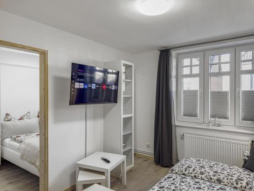 Ένα ή περισσότερα κρεβάτια σε δωμάτιο στο Objekt-Nr 240 - Hafen - Kurgartenstraße