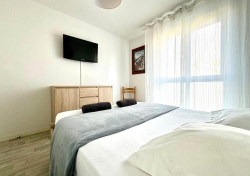 Postel nebo postele na pokoji v ubytování Agréable appartement au centre de La Teste