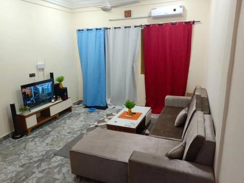 Un lugar para sentarse en Furnished 3-room apartment for rent in Ouagadougou BF
