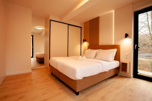 En eller flere senge i et værelse på Lake View Żywiec Resort & SPA