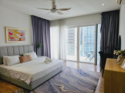 Una cama o camas en una habitación de Quill Residence Kuala Lumpur by PN