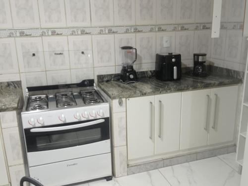 Kuchyň nebo kuchyňský kout v ubytování Casa Alto Padrão px ao Centro