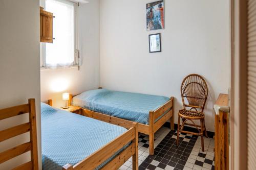 Postel nebo postele na pokoji v ubytování Vue d’Azur à Locquirec