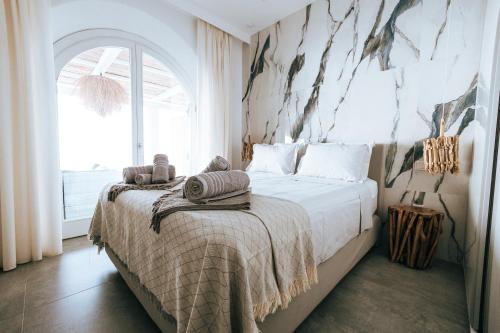 Giường trong phòng chung tại Luxury Apartments La Villa