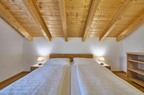 Ένα ή περισσότερα κρεβάτια σε δωμάτιο στο Ferienwohnung Paula