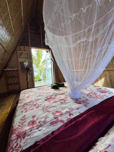 Ένα ή περισσότερα κρεβάτια σε δωμάτιο στο Sea PoeTree