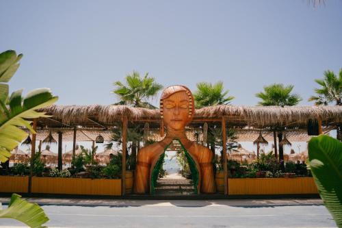 a statue in the middle of the resort at Hotel Empire Albania in Durrës
