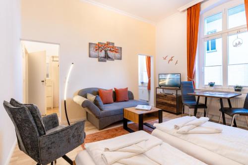 En eller flere senge i et værelse på Schloss Hohenzollern - Wohnung 15