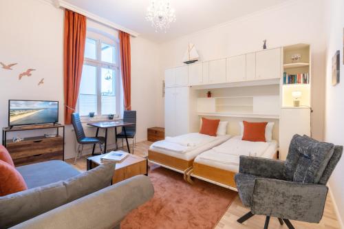 En eller flere senge i et værelse på Schloss Hohenzollern - Wohnung 15