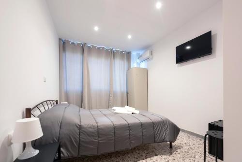 TV a/nebo společenská místnost v ubytování Liberal Gazi