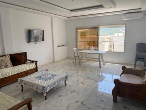 TV a/nebo společenská místnost v ubytování résidence ferjani hechmi