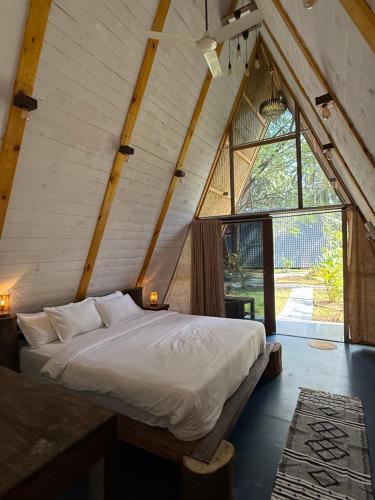 Postel nebo postele na pokoji v ubytování Luma