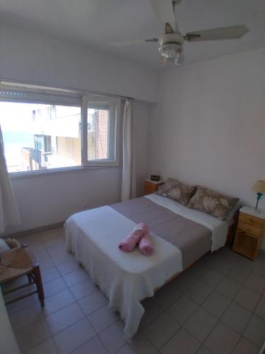 Ένα ή περισσότερα κρεβάτια σε δωμάτιο στο VISTA AL MAR DEPARTAMENTO Excelente ubicación