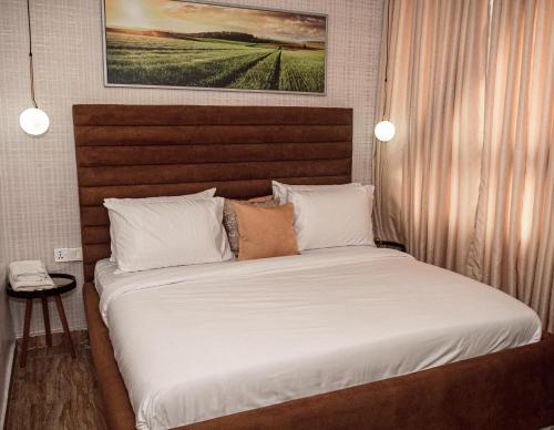 Ένα ή περισσότερα κρεβάτια σε δωμάτιο στο 2 - 4 bedroom apartments in Eko Atlantic City