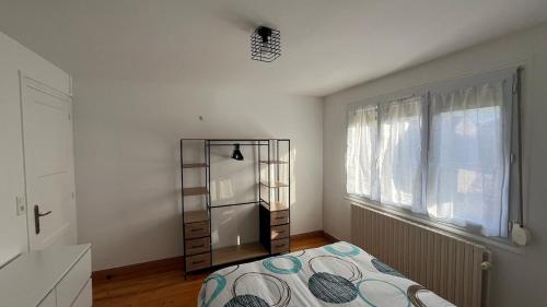 Postel nebo postele na pokoji v ubytování Le Margotin