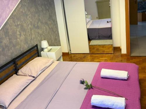 Ένα ή περισσότερα κρεβάτια σε δωμάτιο στο Michelle Luxury Living in centro a Gorizia