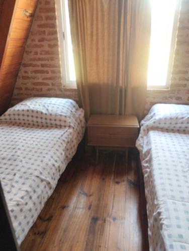 Giường trong phòng chung tại Altos del torreón