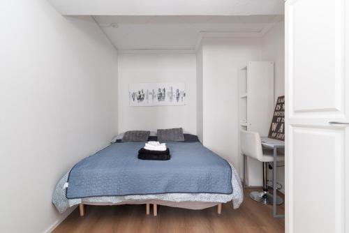 Postel nebo postele na pokoji v ubytování City Pearl