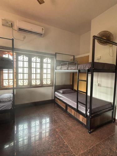Ένα ή περισσότερα κρεβάτια σε δωμάτιο στο Bunk You Hostel