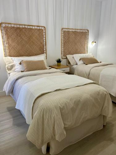 Voodi või voodid majutusasutuse Apartamento acogedor Junto al Mar en Arguineguin toas