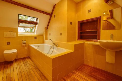 Vannituba majutusasutuses Le Hameau des Prés-Verts, un séjour détente et bien être pour les amoureux de la nature au cœur du Pays d'Auge, en Normandie